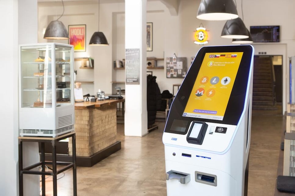 Bitcoin ATM in a modern cafe setting
