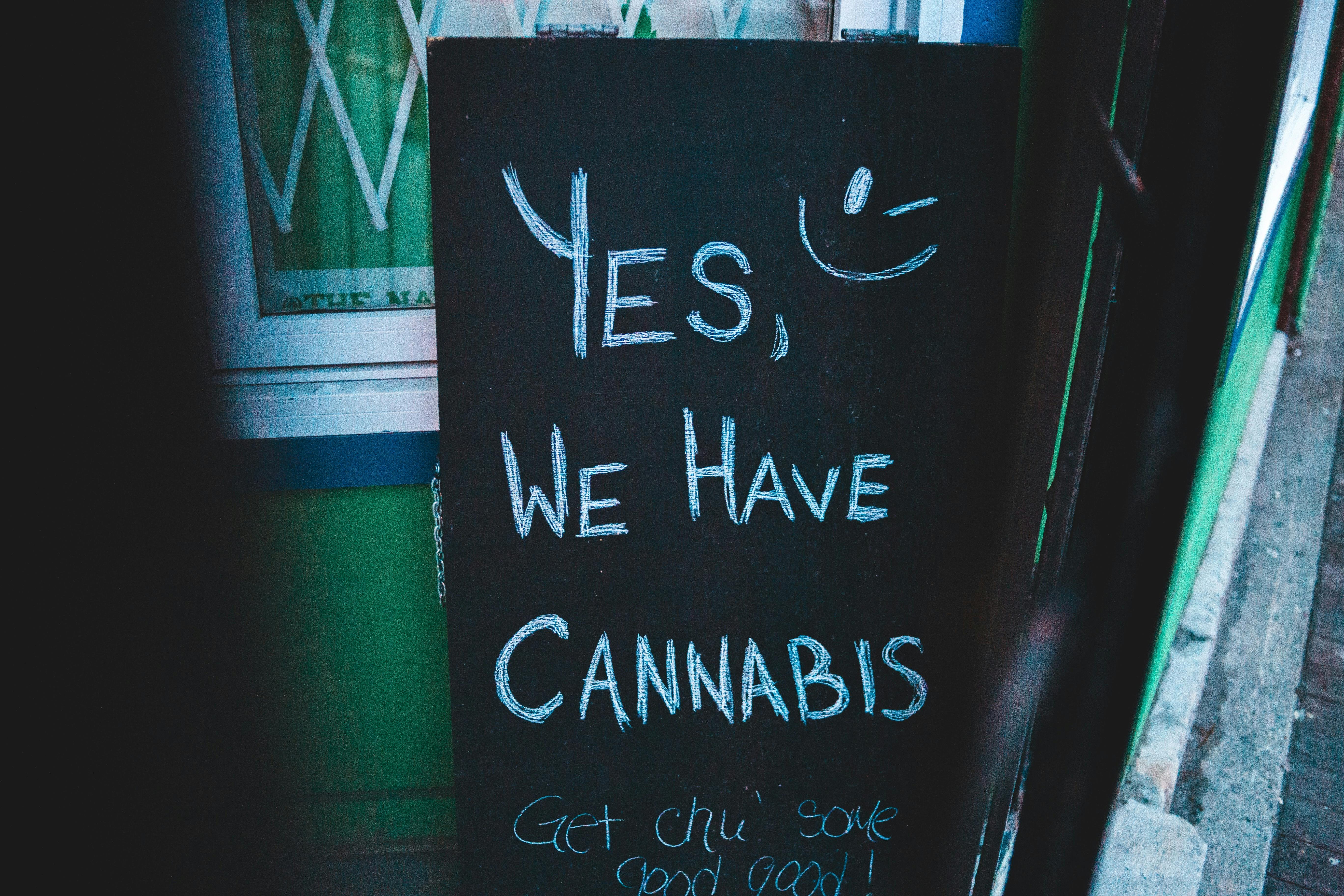 Cannabis availability sign at storefront entrance