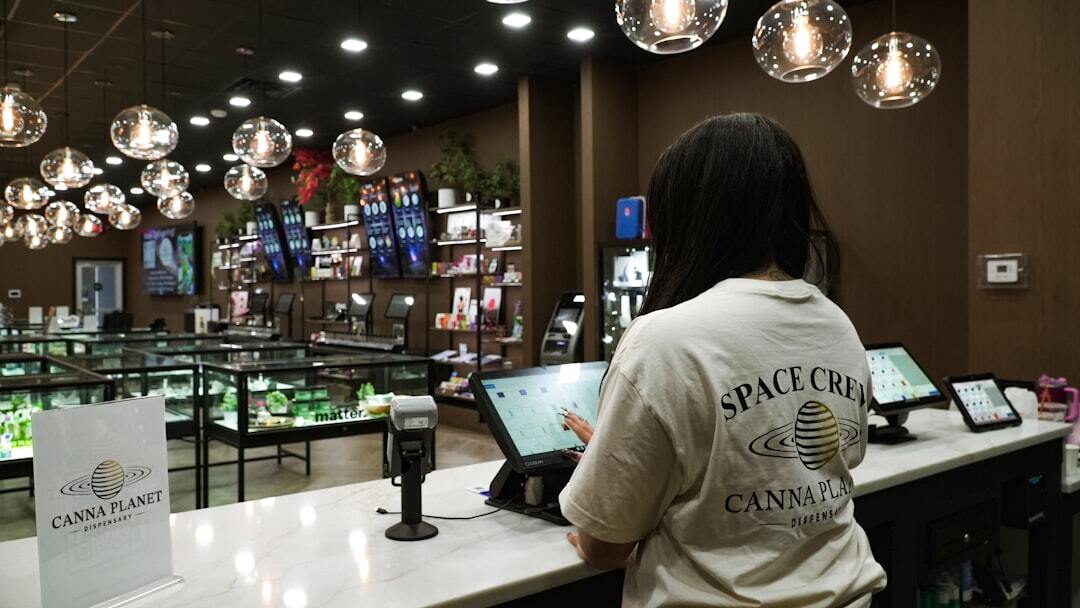 Cannabis dispensary interior with employee working