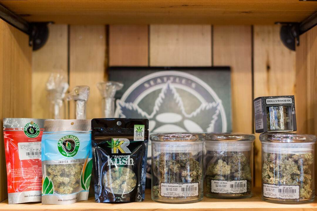 Cannabis products displayed on wooden shelf