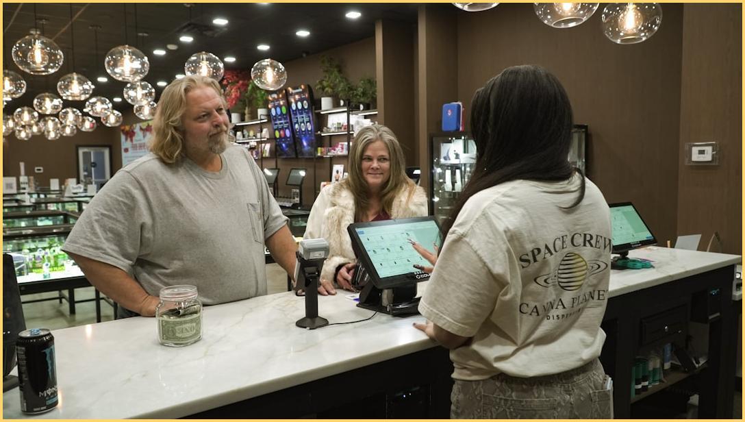 Customer interaction at dispensary checkout counter