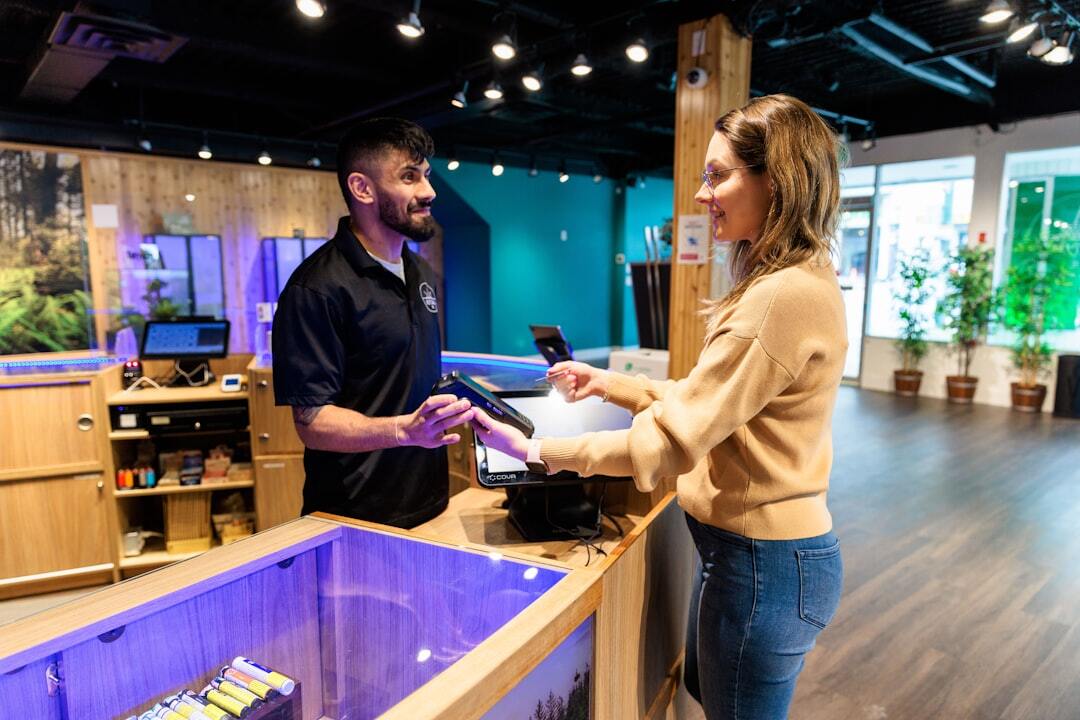 Customer paying at retail counter interaction