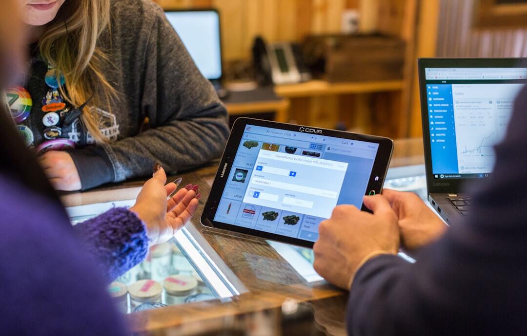 Customer purchasing cannabis at dispensary counter