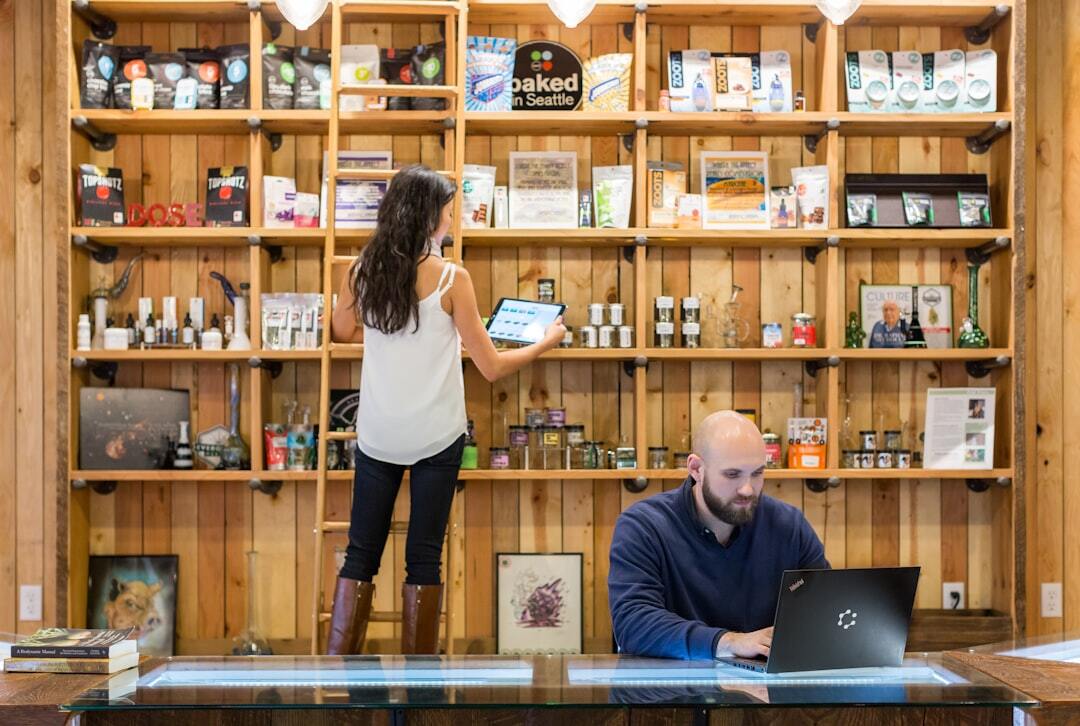 Modern cannabis shop with wooden shelves display