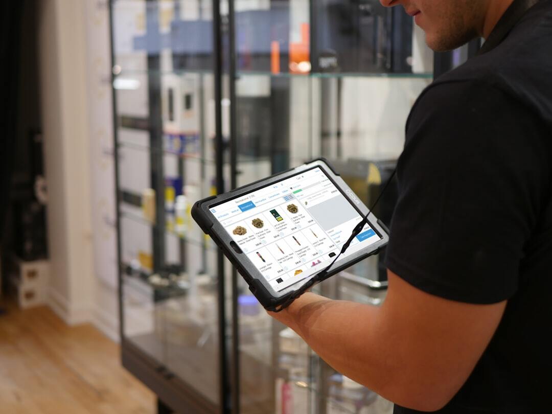 Person using tablet for inventory management